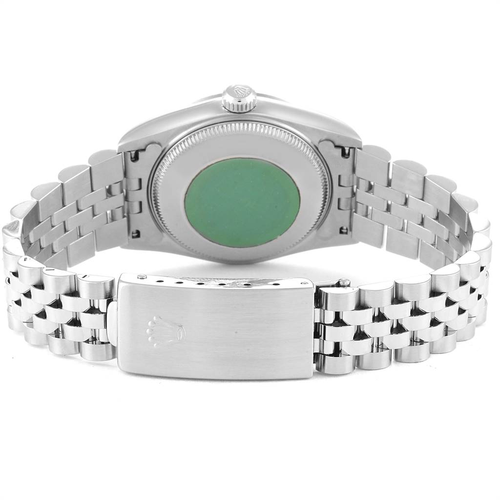 This image shows the back view of a Rolex Mid-Size 68274 Women's Stainless Steel Blue Dial 68274 Women's Stainless Steel Blue Dial model watch, focusing on the case back and bracelet clasp.