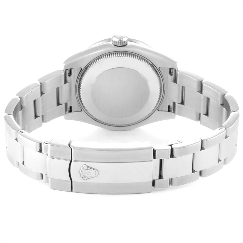 This image shows the backside of a Rolex Mid-Size 178384 Women's Stainless Steel Mother of Pearl Dial 178384 Women's Stainless Steel Mother of Pearl Dial model watch, showcasing the case back, crown, and closed clasp.