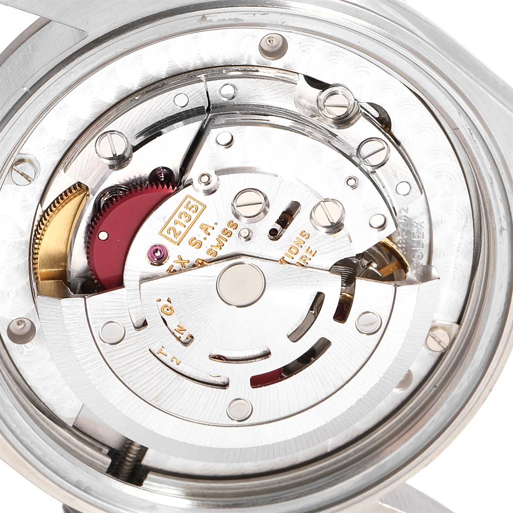 The image shows the internal mechanical movement of a Rolex Mid-Size 68240 Women's Stainless Steel Pink Dial 68240 Women's Stainless Steel Pink Dial watch, viewed from the back.
