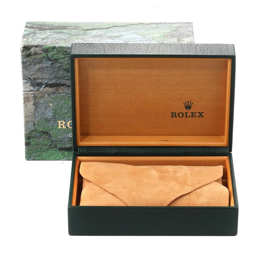 The image shows an open Rolex watch box for a Mid-Size model, displaying its inner cushion and branded wooden interior.
