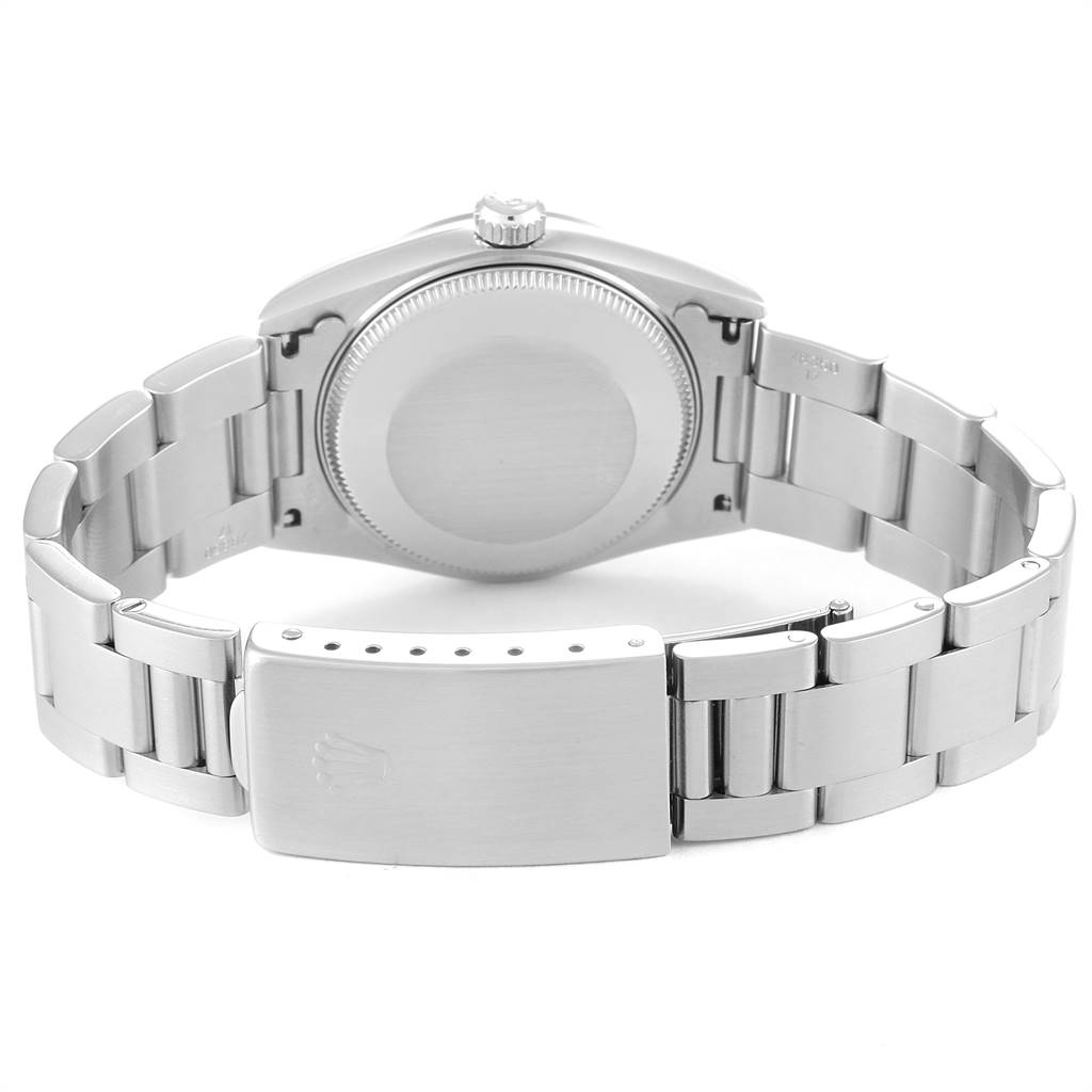 This image shows the back view of a Rolex Mid-Size 68240 Women's Stainless Steel Pink Dial 68240 Women's Stainless Steel Pink Dial watch, highlighting the case back and bracelet with a clasp.