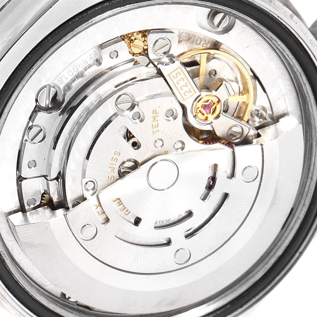 The image shows the internal mechanism and movement of the Rolex Mid-Size 178344 Women's Stainless Steel Mother of Pearl Dial 178344 Women's Stainless Steel Mother of Pearl Dial model watch from a close-up angle.