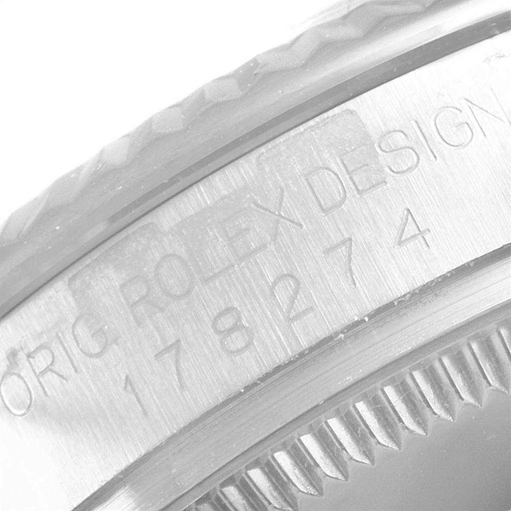 Close-up of the bezel and case side of a Rolex Mid-Size 178274 Women's Stainless Steel Mother of Pearl Dial 178274 Women's Stainless Steel Mother of Pearl Dial watch, showing the engraved model number "178274."
