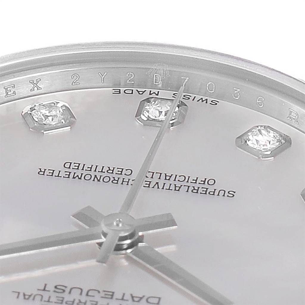 The image shows a close-up of the dial, hands, and part of the bezel of a Rolex Mid-Size 178274 Women's Stainless Steel Mother of Pearl Dial 178274 Women's Stainless Steel Mother of Pearl Dial watch.