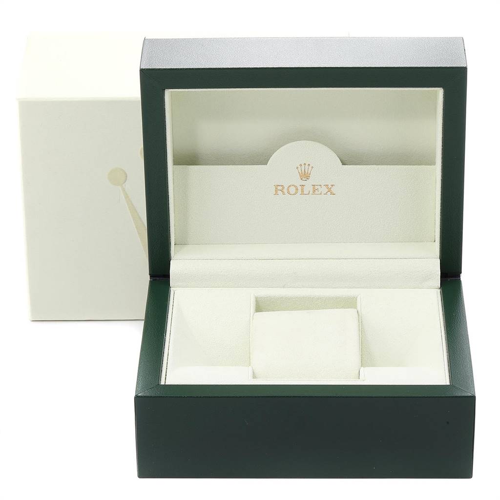 The image shows an open Rolex watch box without the Mid-Size Rolex watch, featuring its green and white padded interior.