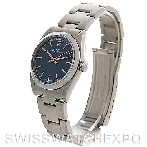 The image shows a mid-size Rolex watch angled to display the face, casing, and partially open bracelet.