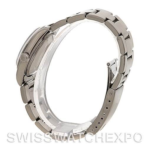 The image shows a side view of the Rolex Mid-Size 77080 Women's Stainless Steel Blue Dial 77080 Women's Stainless Steel Blue Dial watch, focusing on the bracelet and profile of the case.