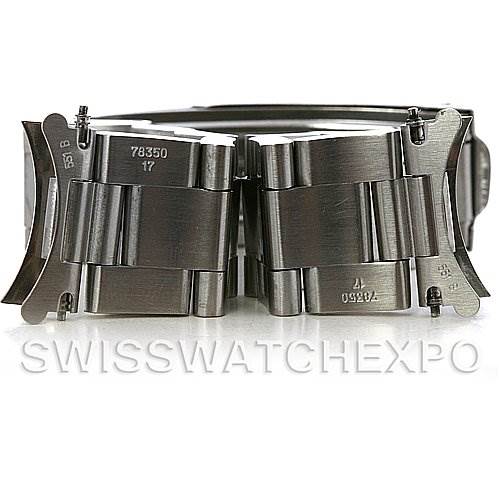 The image shows a close-up view of the clasp and links of a Mid-Size Rolex watch bracelet.