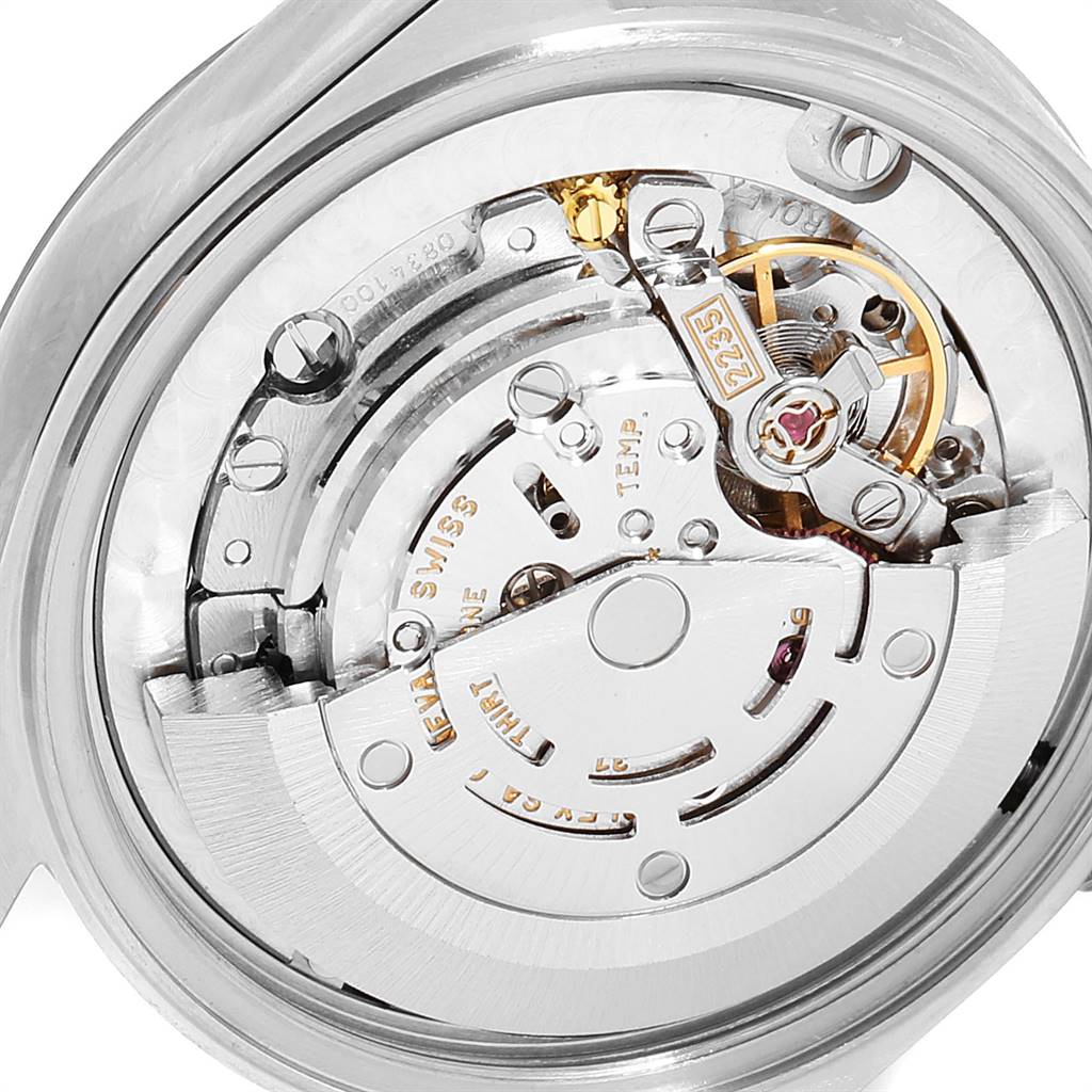 This image shows a close-up view of the movement inside a Rolex Mid-Size 78240 Women's Stainless Steel Blue Dial 78240 Women's Stainless Steel Blue Dial model watch.