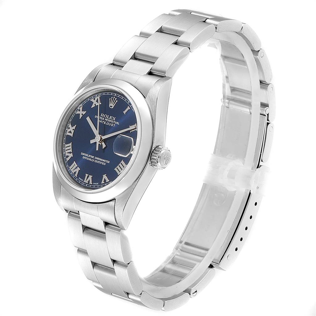 The image shows a side angle of a Rolex Mid-Size 78240 Women's Stainless Steel Blue Dial 78240 Women's Stainless Steel Blue Dial Datejust watch, featuring a blue dial with Roman numerals and a stainless steel bracelet.