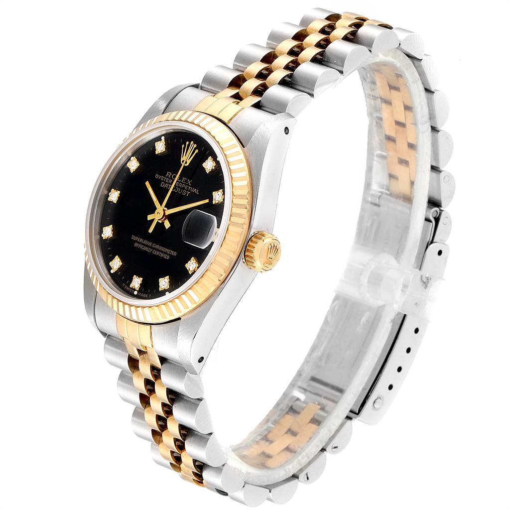 This image shows a Mid-Size Rolex watch at an angled side view, highlighting its gold and silver bracelet, black dial, and fluted bezel.