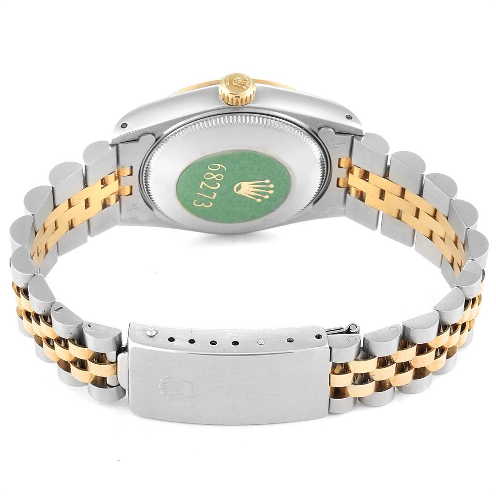 The image shows the back view of a Mid-Size Rolex watch, highlighting the bracelet and clasp.
