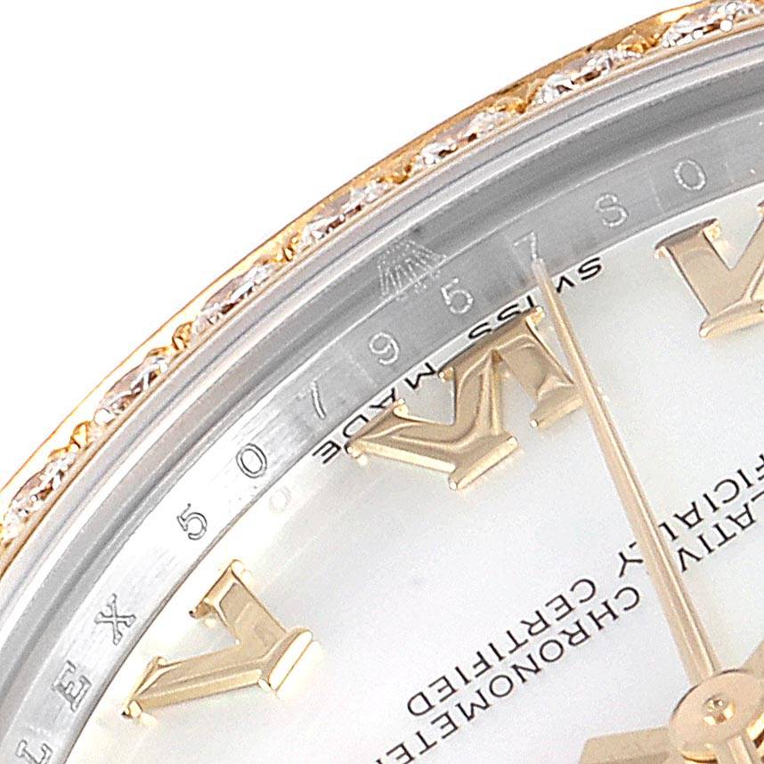This close-up image shows the dial, hands, and a portion of the bezel on the Rolex Mid-Size 178383 Women
s Steel and Gold (two tone) Mother of Pearl Dial 178383 Women
s Steel and Gold (two tone) Mother of Pearl Dial watch.