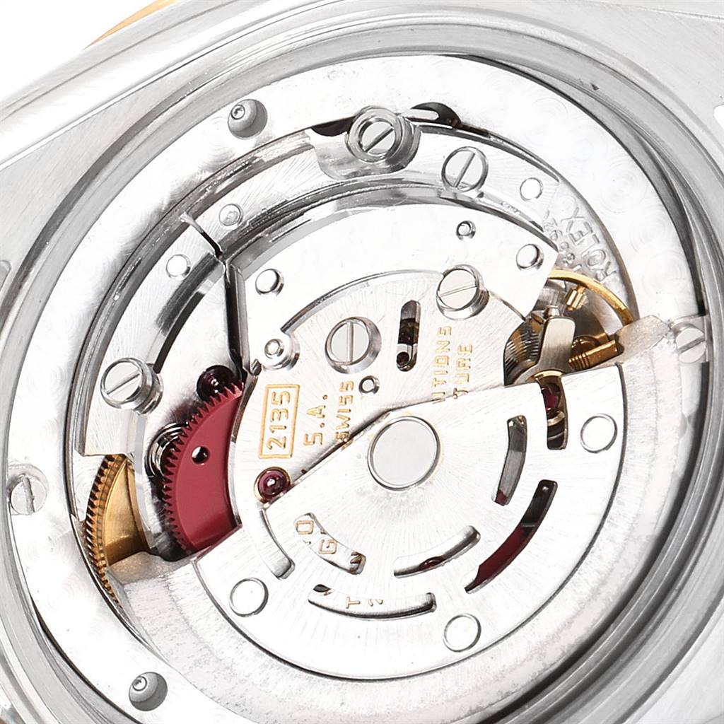 This image shows the internal mechanism of a Rolex Mid-Size 68273 Women's Steel and Gold (two tone) Champagne Dial 68273 Women's Steel and Gold (two tone) Champagne Dial model watch, viewed from the back.