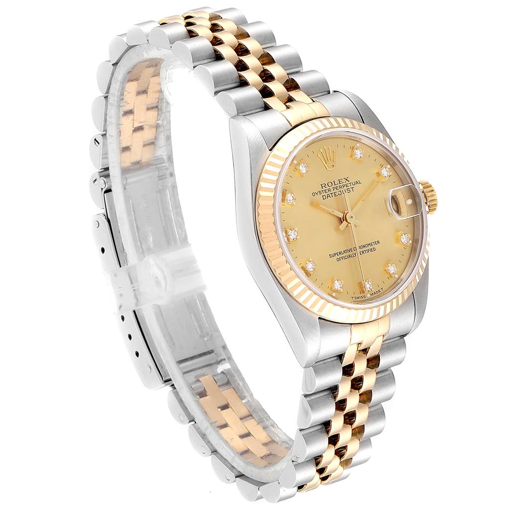 The image shows a Rolex Mid-Size 68273 Women's Steel and Gold (two tone) Champagne Dial 68273 Women's Steel and Gold (two tone) Champagne Dial Oyster Perpetual Datejust watch at a slight angle, revealing the face and stainless steel and gold bracelet.