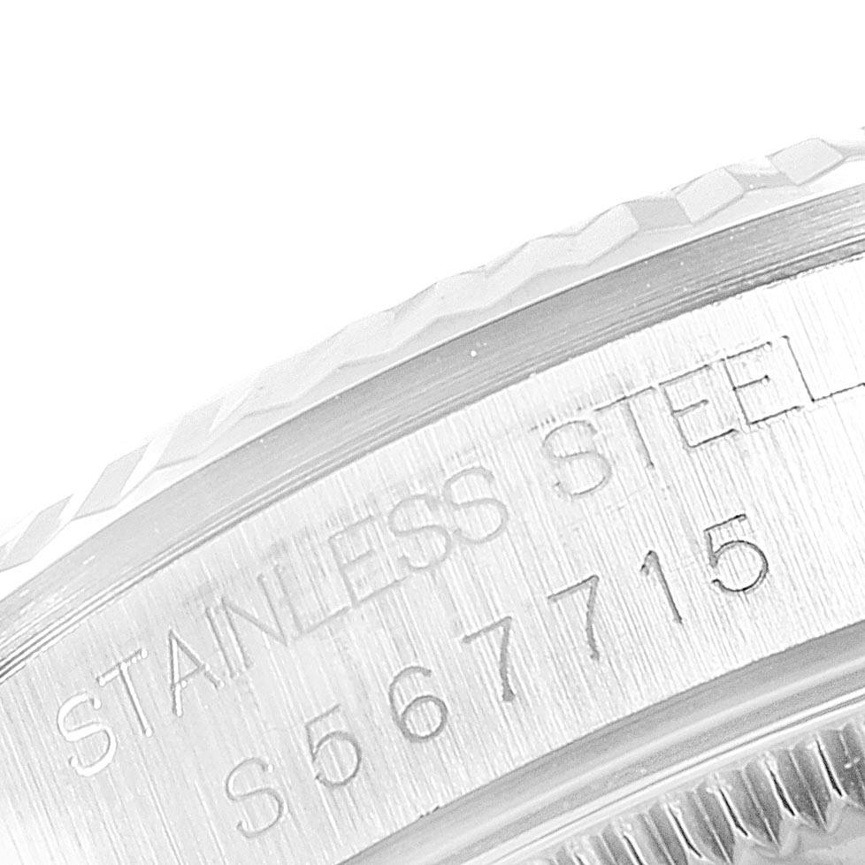 This image shows a close-up of the case with engraved serial number on a Rolex Mid-Size 68274 Women's Stainless Steel Silver Dial 68274 Women's Stainless Steel Silver Dial watch.