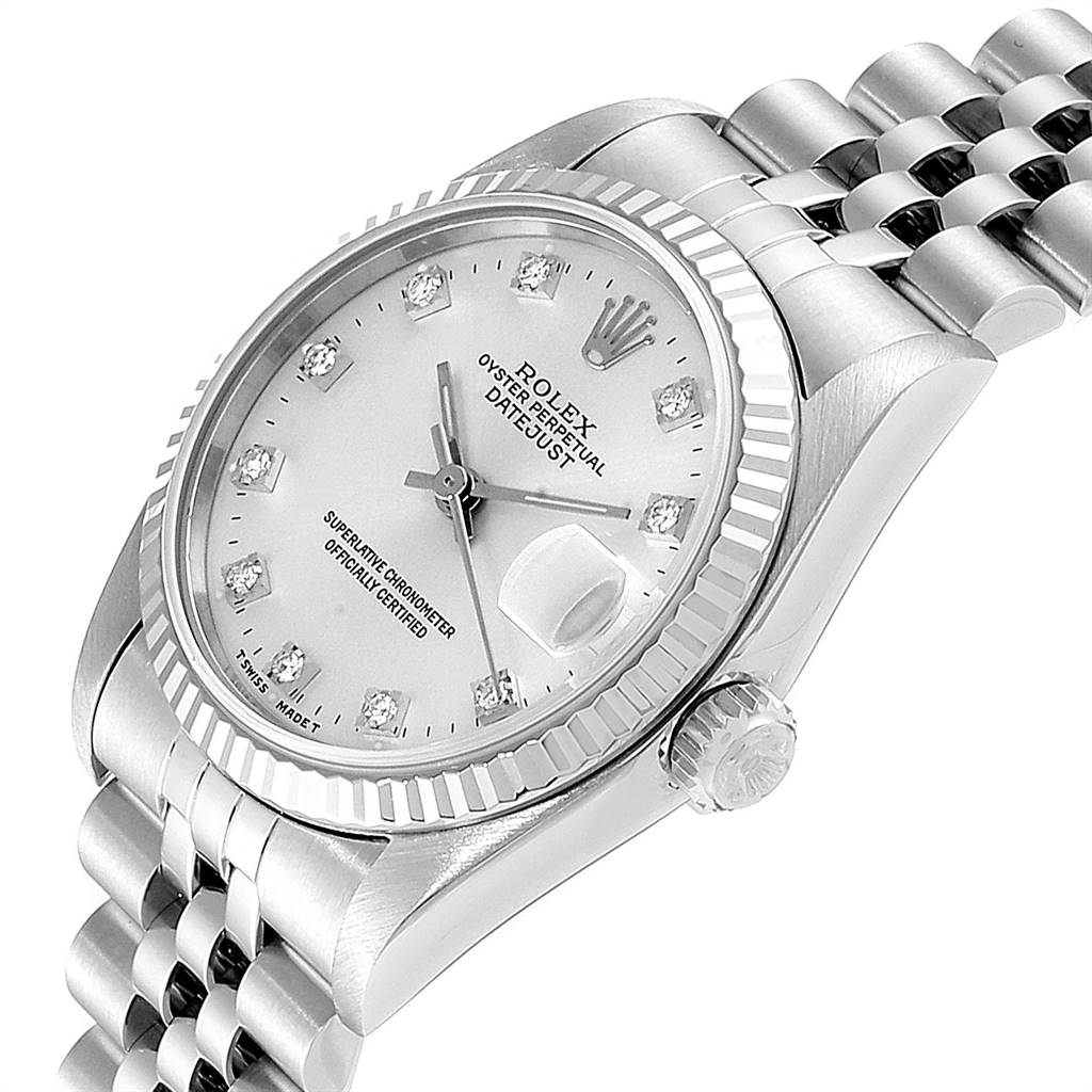 The image shows a frontal angled view of a Mid-Size Rolex Oyster Perpetual Datejust, highlighting the dial, bezel, and bracelet.