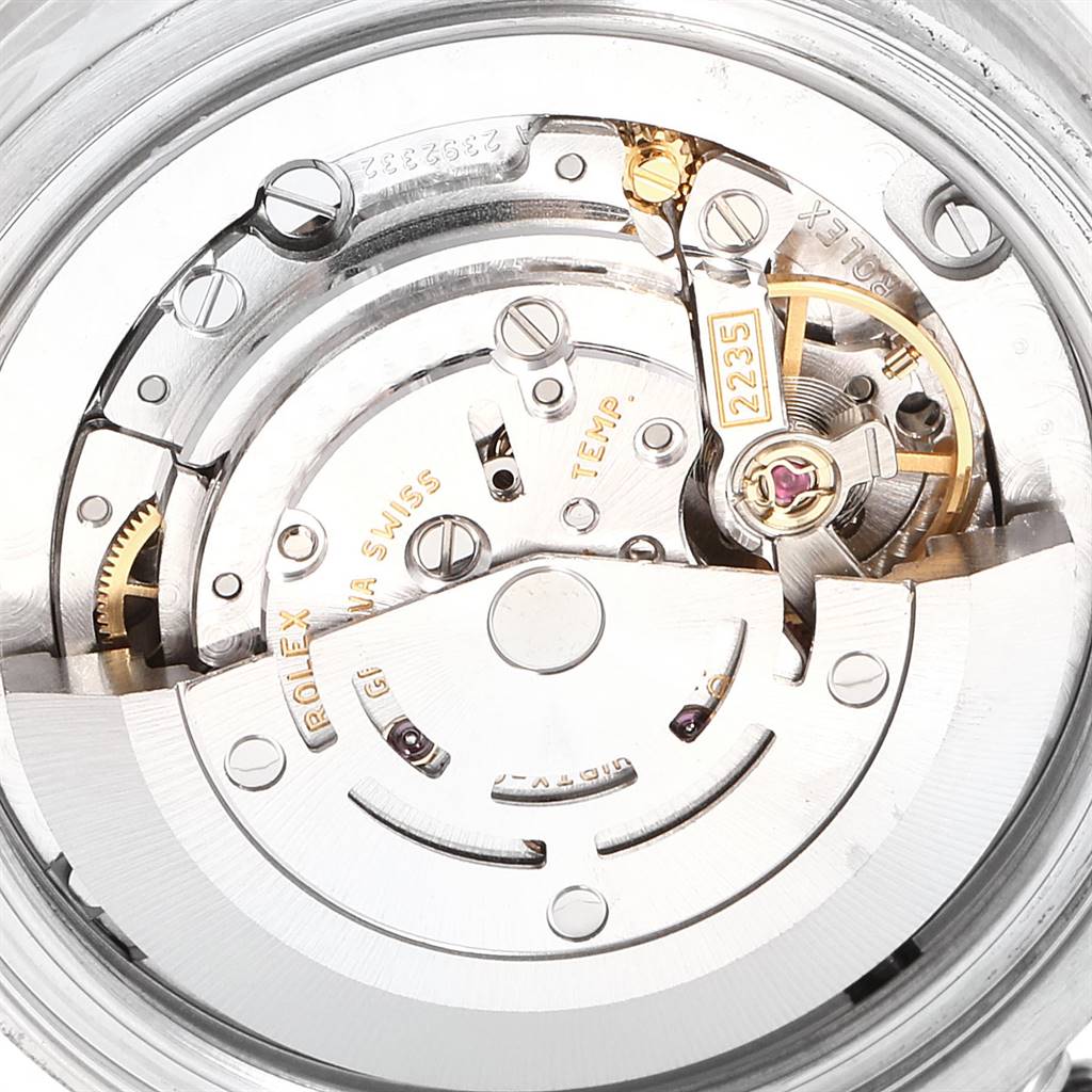 The image shows the intricate internal movement of the Rolex Mid-Size 178384 Women's Stainless Steel Mother of Pearl Dial 178384 Women's Stainless Steel Mother of Pearl Dial watch from a close-up, top-down angle.