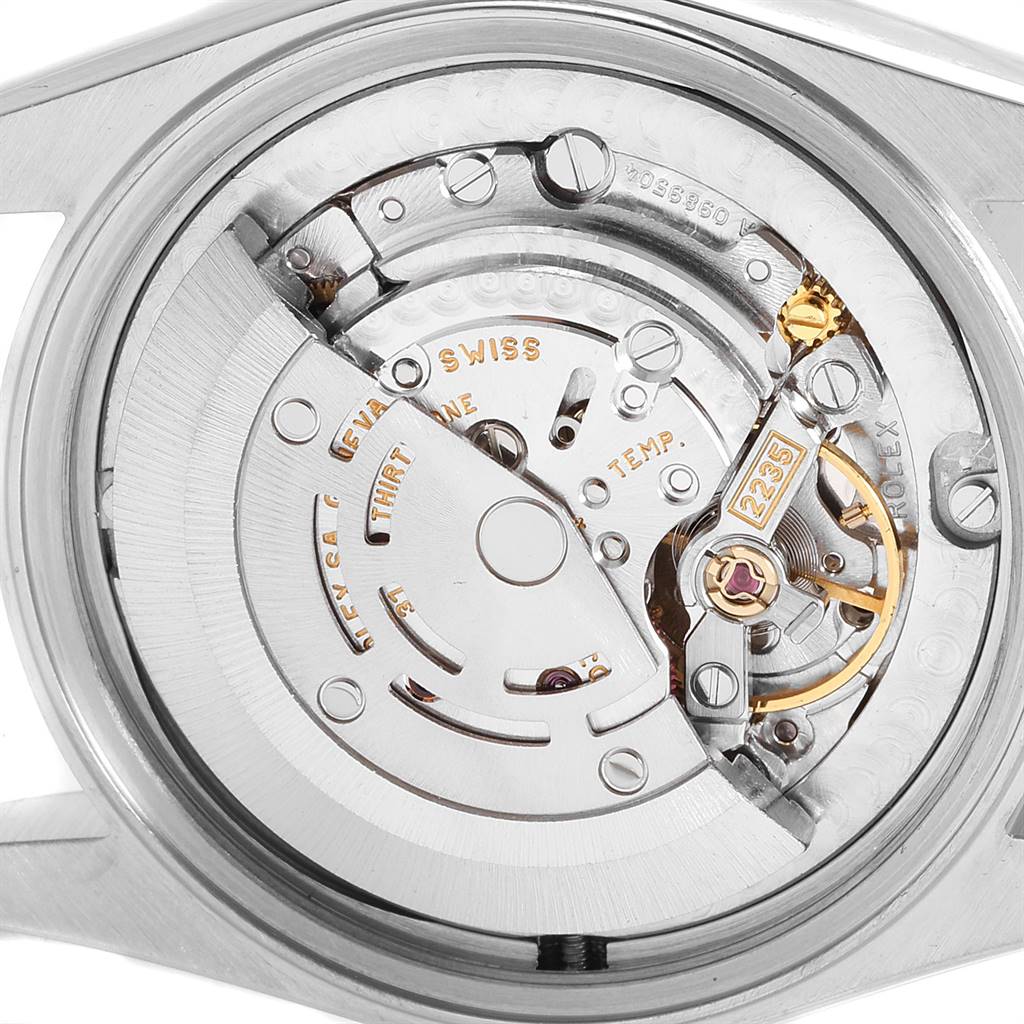 This image shows the internal mechanical movement of a Mid-Size Rolex watch from a back view.