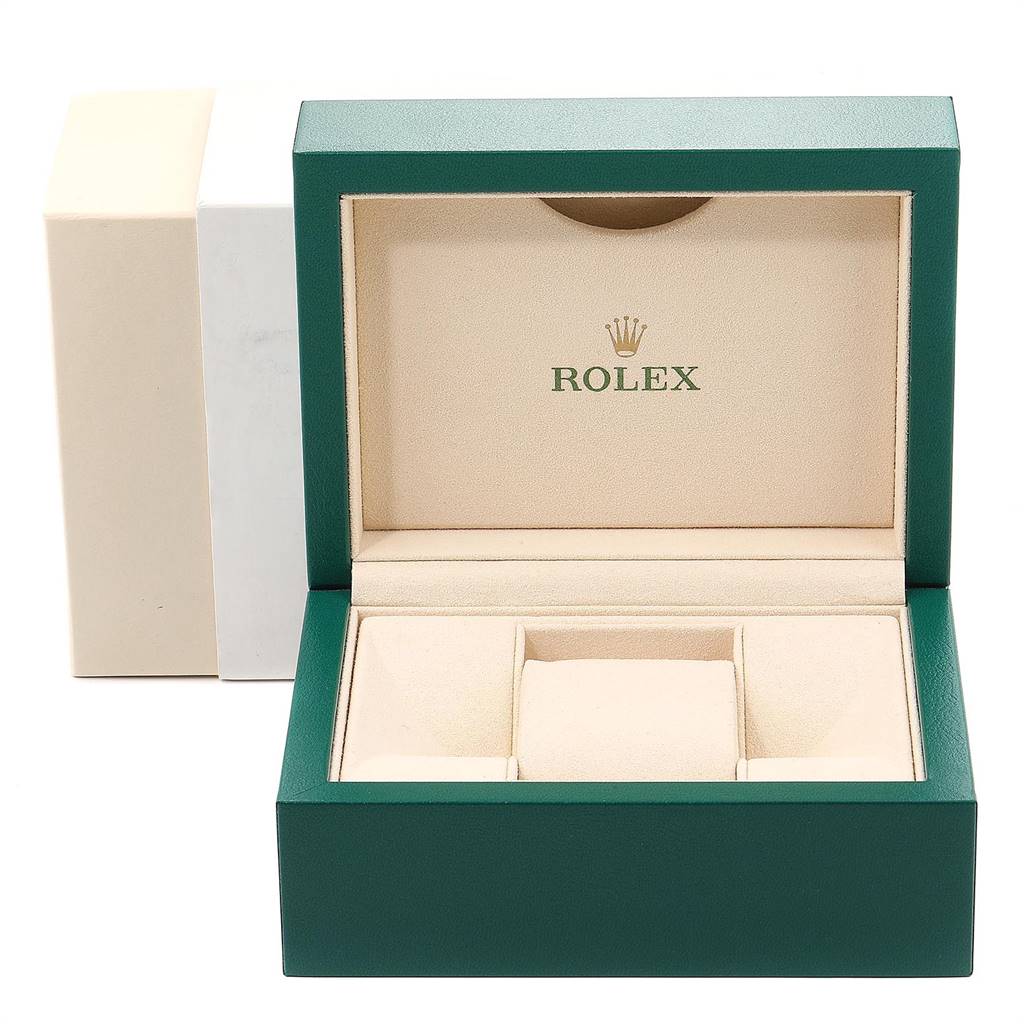 This image shows the open green and beige display box of a Rolex Mid-Size 178274 Women's Stainless Steel Blue Dial 178274 Women's Stainless Steel Blue Dial model, viewed from the front.