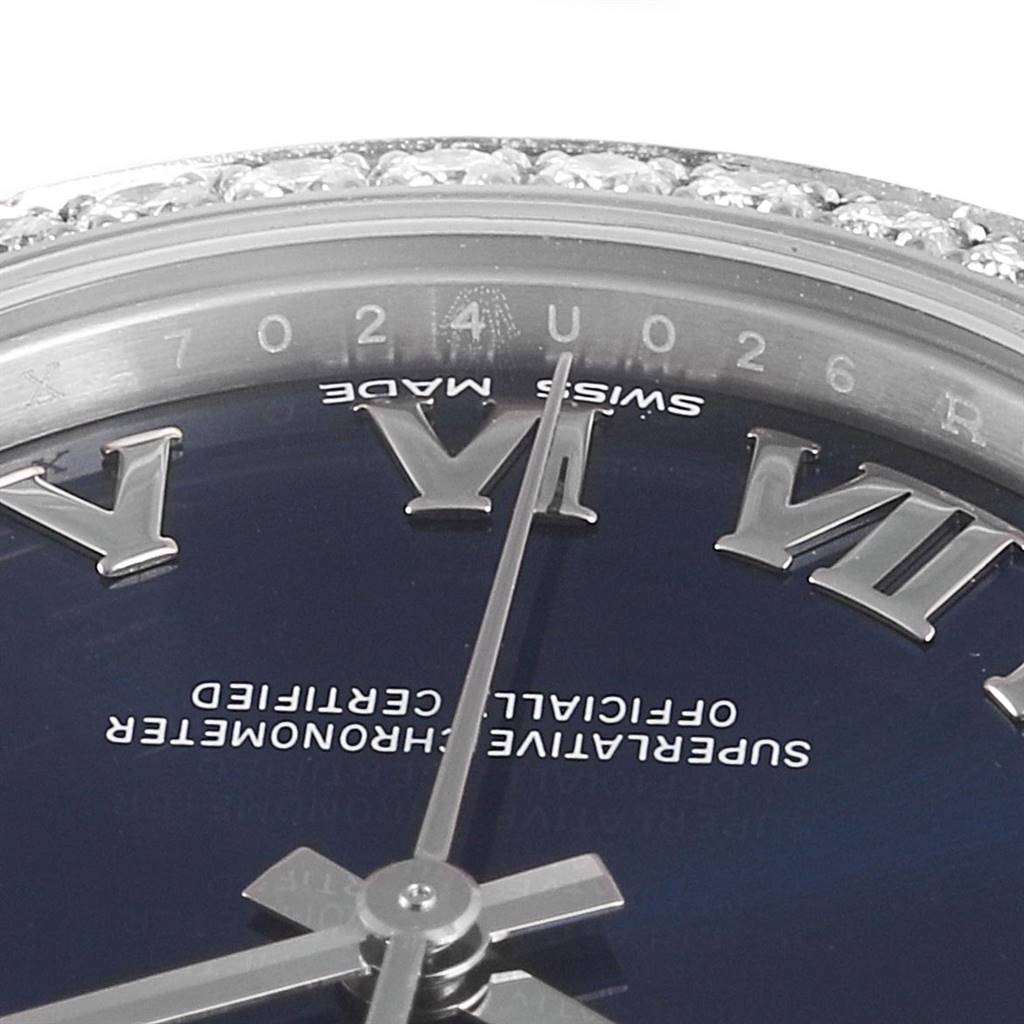 The image shows a close-up, angled view of the dial, hands, and part of the bezel of a Rolex Mid-Size 178384 Women's Stainless Steel Blue Dial 178384 Women's Stainless Steel Blue Dial watch.