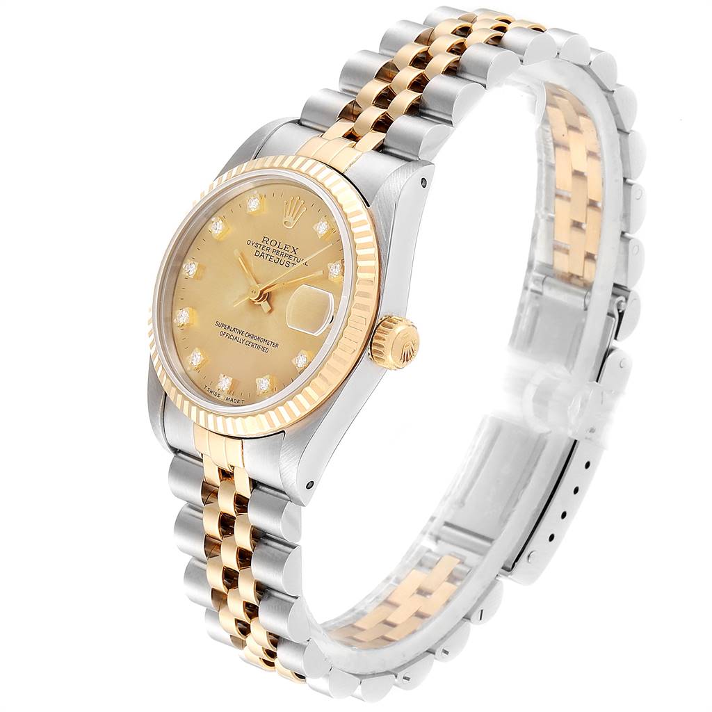 The image shows a Rolex Mid-Size 68273 Women's Steel and Gold (two tone) Champagne Dial 68273 Women's Steel and Gold (two tone) Champagne Dial Datejust watch angled from the front left, highlighting its gold and silver bracelet and champagne dial.