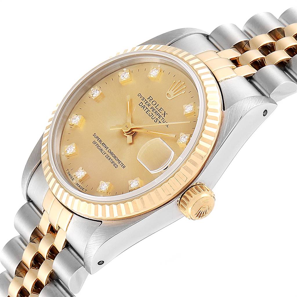 This image shows a close-up angled view of the Rolex Mid-Size 68273 Women's Steel and Gold (two tone) Champagne Dial 68273 Women's Steel and Gold (two tone) Champagne Dial Datejust watch, highlighting the dial, crown, and part of the bracelet.
