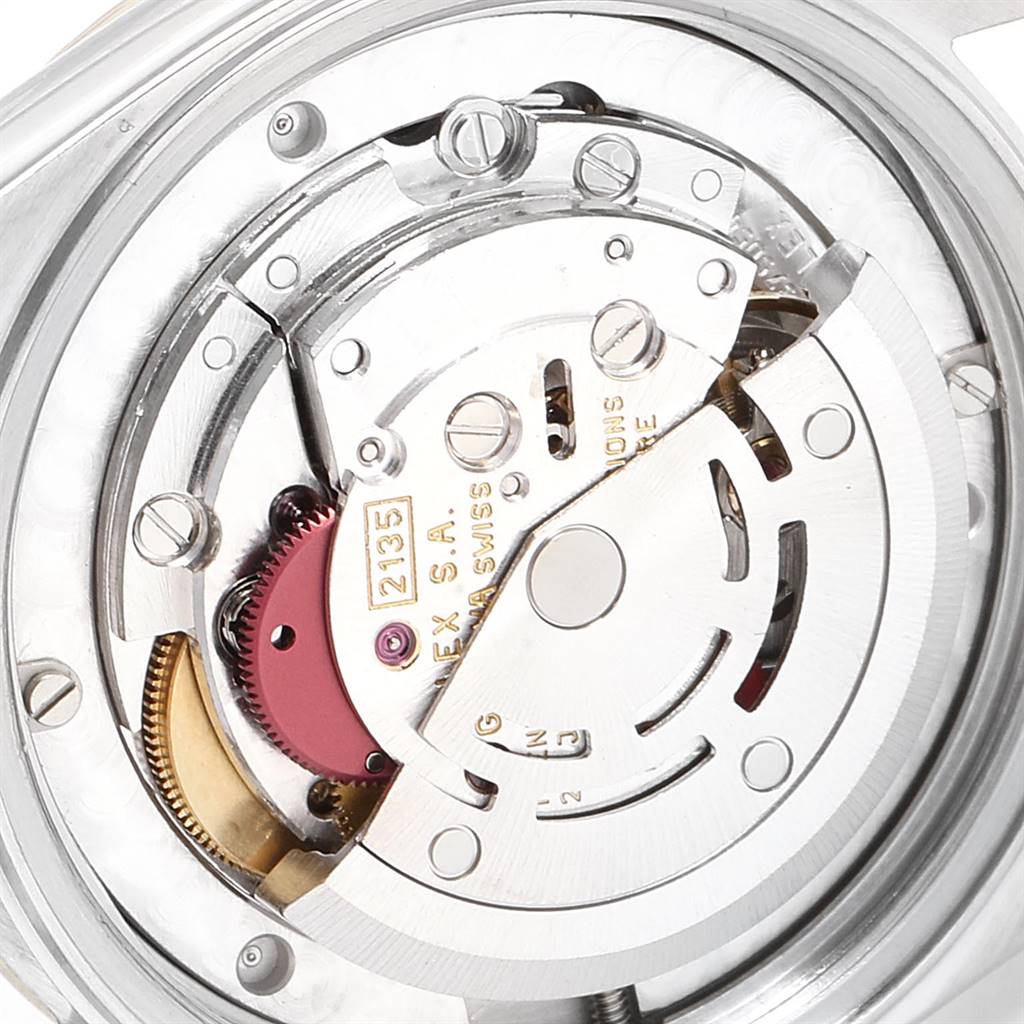 The image shows a close-up of the internal movement mechanism of a Rolex Mid-Size 68273 Women's Steel and Gold (two tone) Champagne Dial 68273 Women's Steel and Gold (two tone) Champagne Dial watch.
