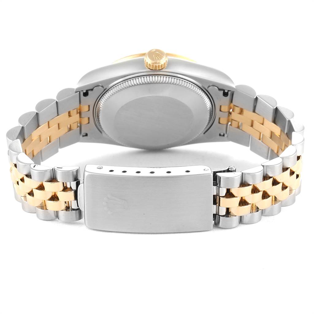 The image shows the back and bracelet of the Rolex Mid-Size 68273 Women's Steel and Gold (two tone) Champagne Dial 68273 Women's Steel and Gold (two tone) Champagne Dial model watch, highlighting its two-tone design and clasp.