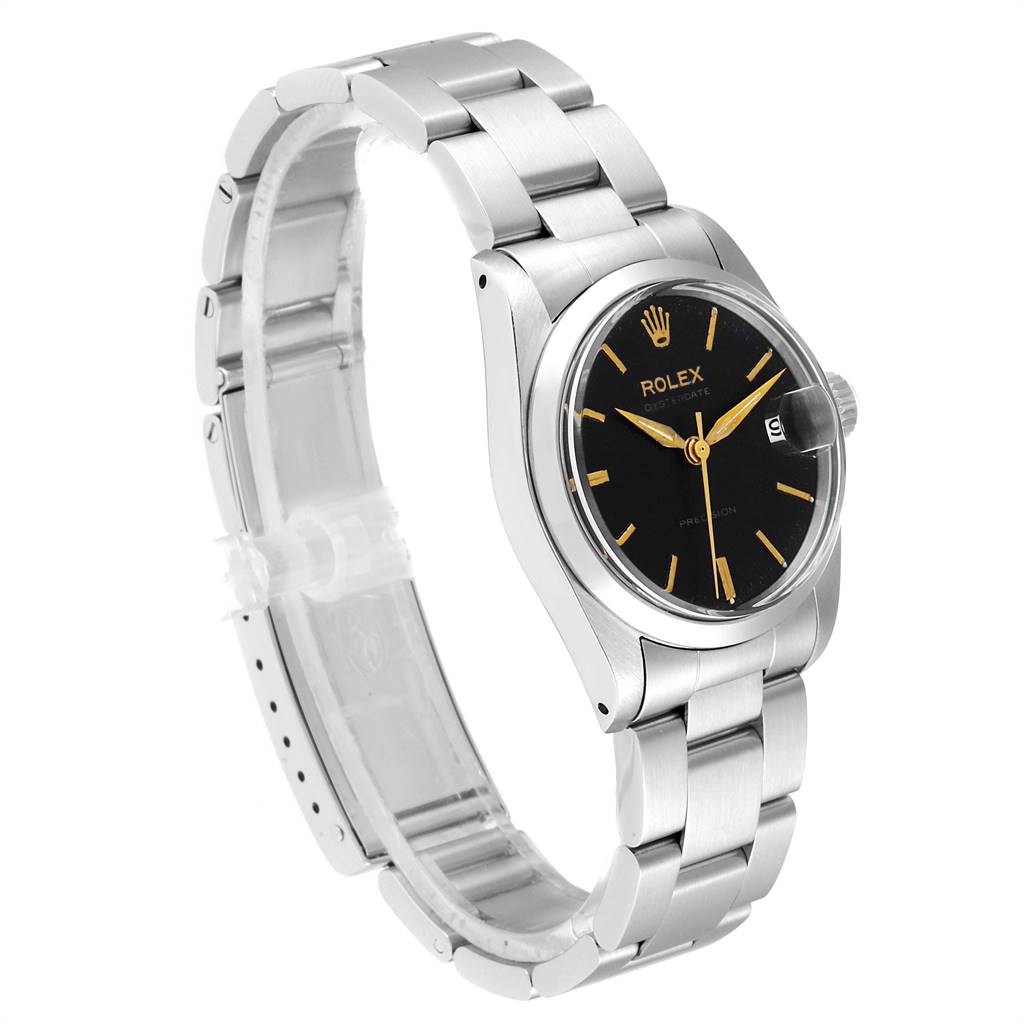 This image shows a side angle view of a Rolex Mid-Size 6466 Women's Stainless Steel Black Dial 6466 Women's Stainless Steel Black Dial watch featuring its bracelet, black dial, and a date display.