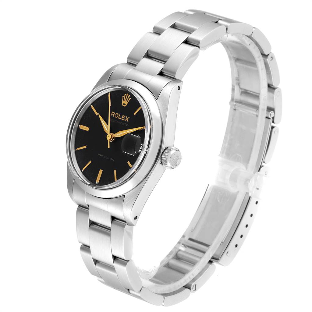 The image shows a Mid-Size Rolex watch from a front-side angle, highlighting the dial, case, crown, and bracelet.