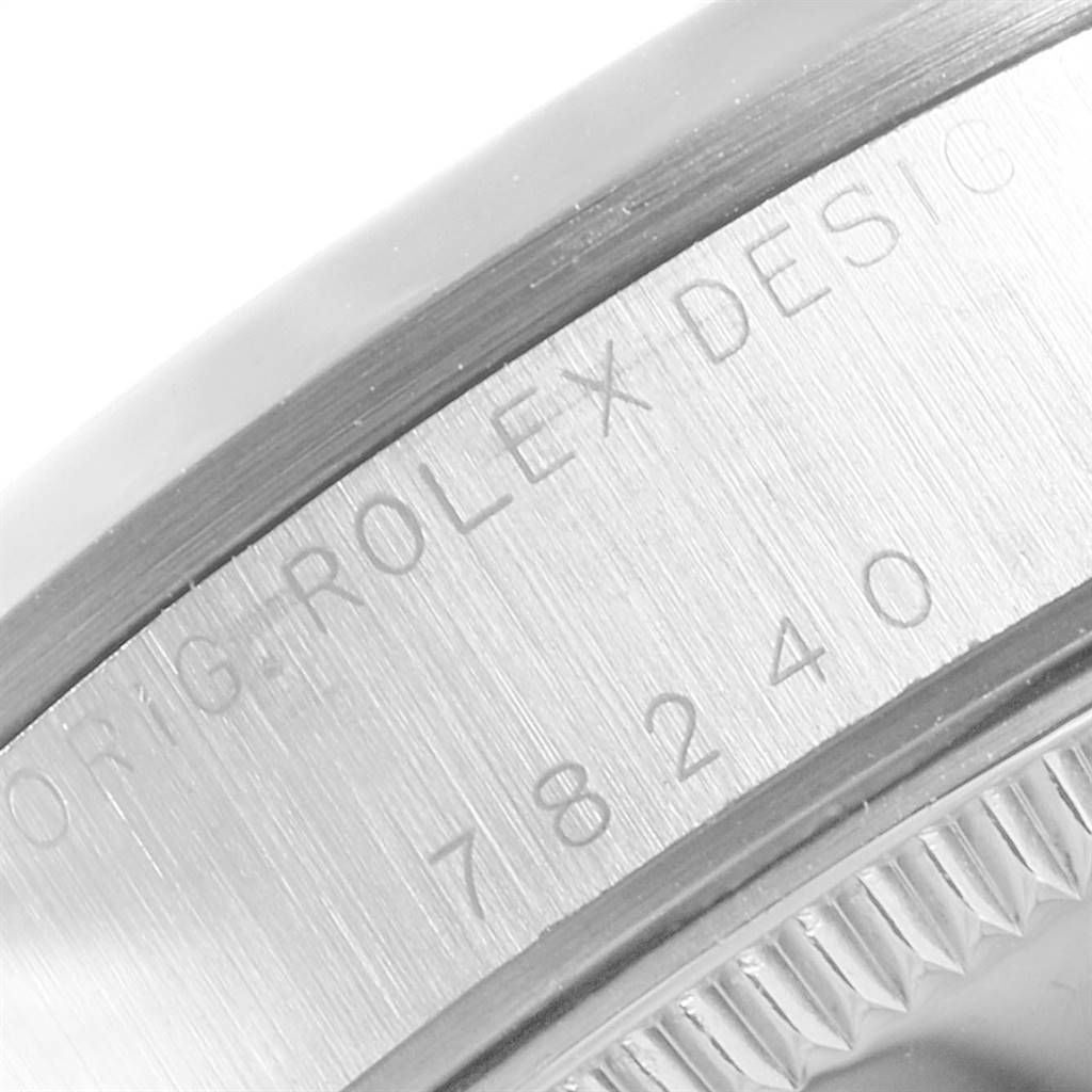 This close-up image shows the case back engravings of a mid-size Rolex watch, specifically displaying model number 78240 and "ROLEX DESIGN."