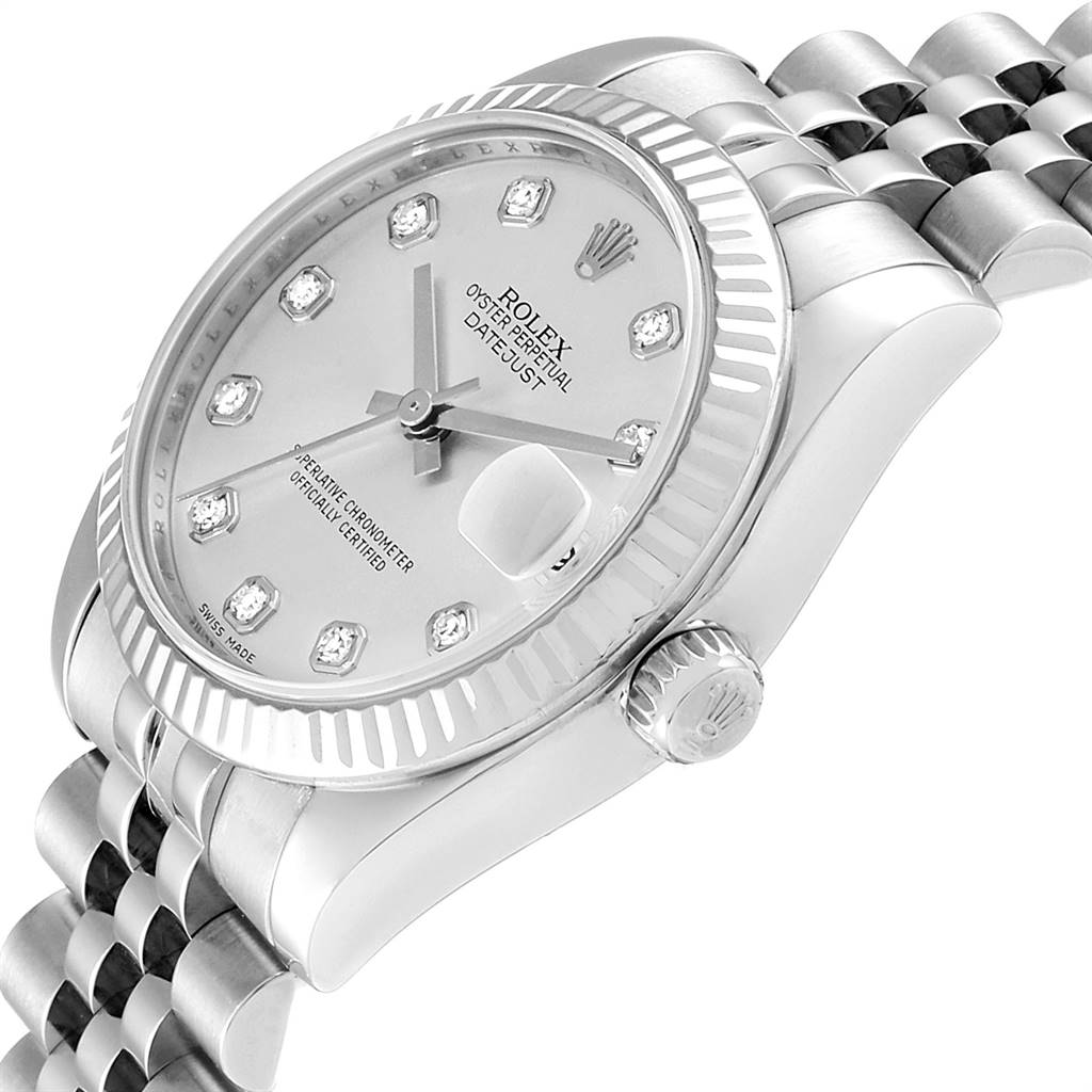 This image shows a Rolex Mid-Size 178274 Women's Stainless Steel Silver Dial 178274 Women's Stainless Steel Silver Dial Datejust watch at an angled side view, highlighting the face, bezel, crown, and part of the bracelet.