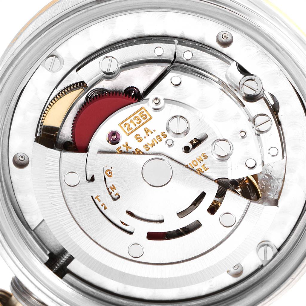 This close-up image shows the internal movement mechanism of a Rolex Mid-Size 68273 Women's Steel and Gold (two tone) Champagne Dial 68273 Women's Steel and Gold (two tone) Champagne Dial model watch.