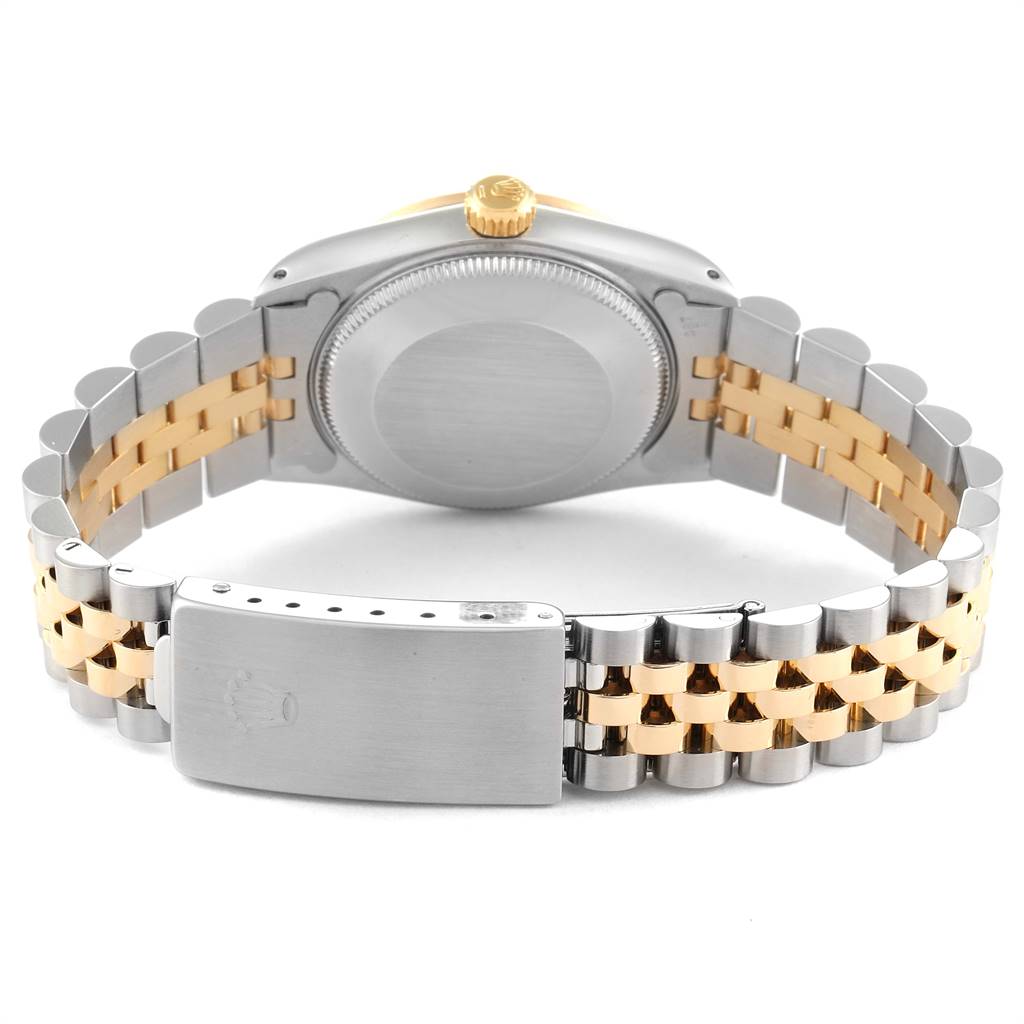 This image shows the back and bracelet of a Rolex Mid-Size 68273 Women's Steel and Gold (two tone) Champagne Dial 68273 Women's Steel and Gold (two tone) Champagne Dial watch, highlighting its two-tone metal design.