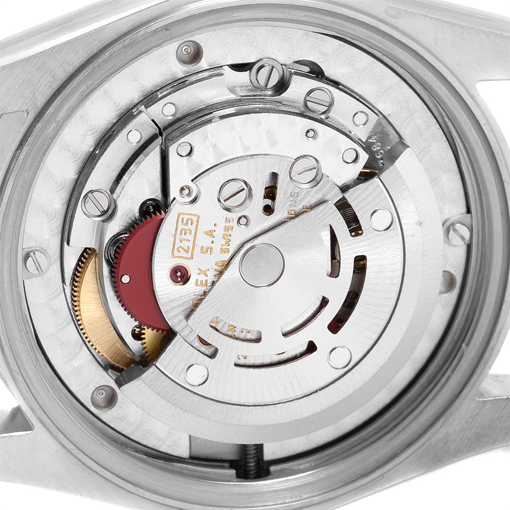 This image shows the internal mechanical movement of a Rolex Mid-Size 68273 Women's Steel and Gold (two tone) Champagne Dial 68273 Women's Steel and Gold (two tone) Champagne Dial model watch from a rear-angle view.
