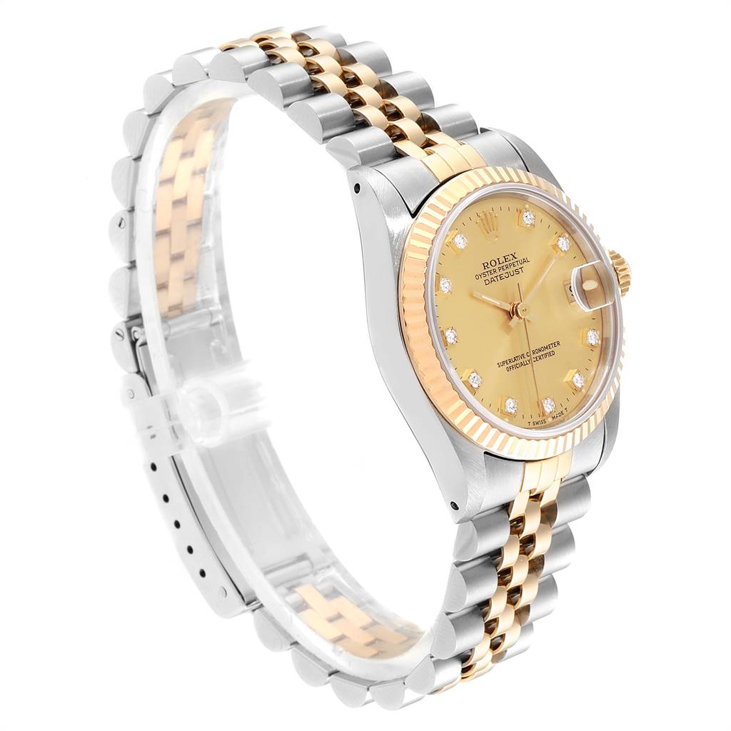 This Rolex Mid-Size 68273 Women's Steel and Gold (two tone) Champagne Dial 68273 Women's Steel and Gold (two tone) Champagne Dial model is shown at an angle displaying its dial, bezel, and two-tone bracelet.