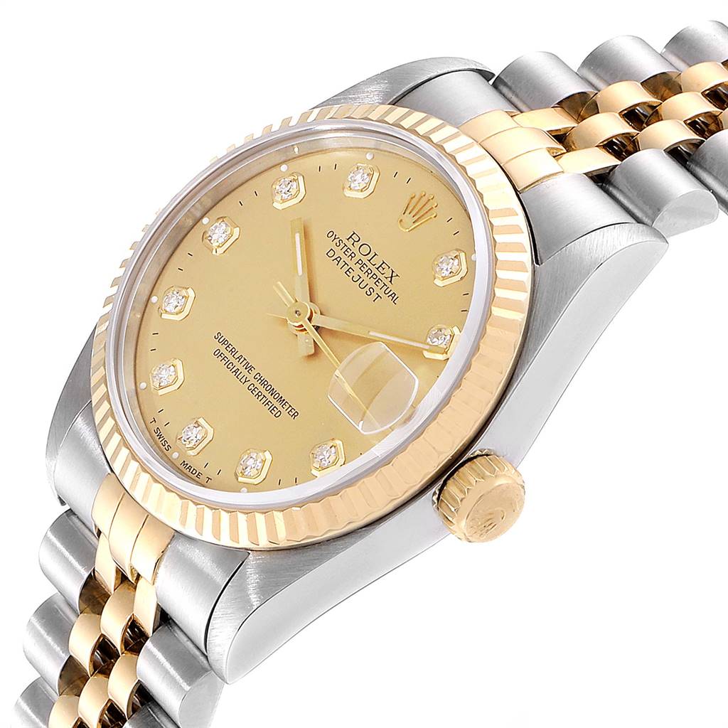 The image shows a side view of a Rolex Mid-Size 68273 Women's Steel and Gold (two tone) Champagne Dial 68273 Women's Steel and Gold (two tone) Champagne Dial watch, highlighting the bezel, crown, and bracelet.
