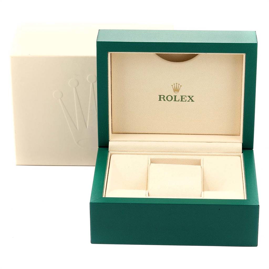 This image shows an open Rolex watch box for the Mid-Size model, featuring a beige interior and green exterior.