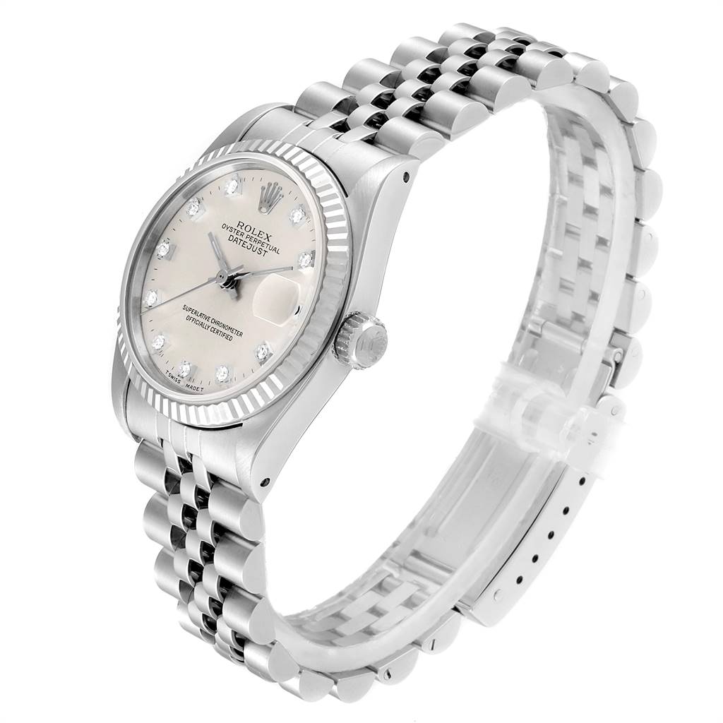 The image shows a side view of a Mid-Size Rolex watch, highlighting the dial, bezel, crown, and part of the bracelet.