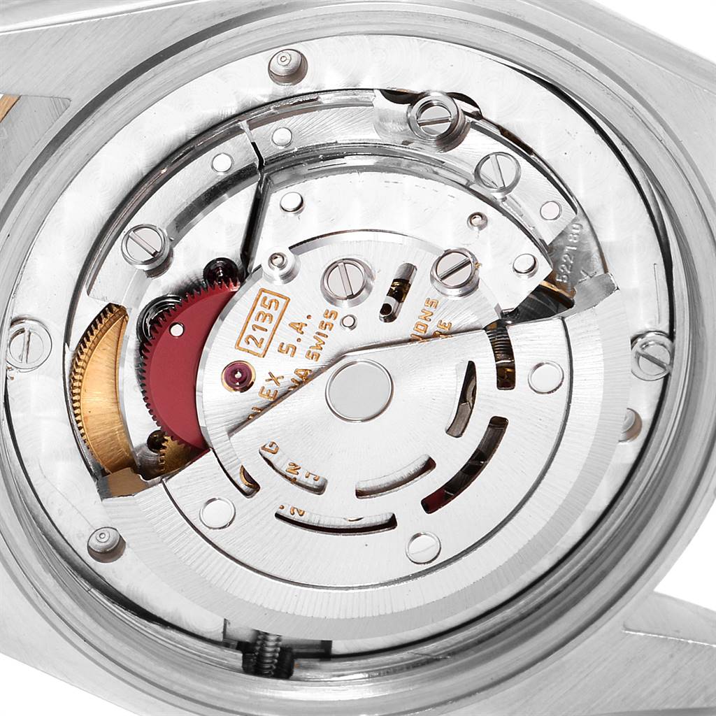 This image shows the internal mechanical movement of a Rolex Mid-Size 68273 Women's Steel and Gold (two tone) Champagne Dial 68273 Women's Steel and Gold (two tone) Champagne Dial model watch, viewed from the back.