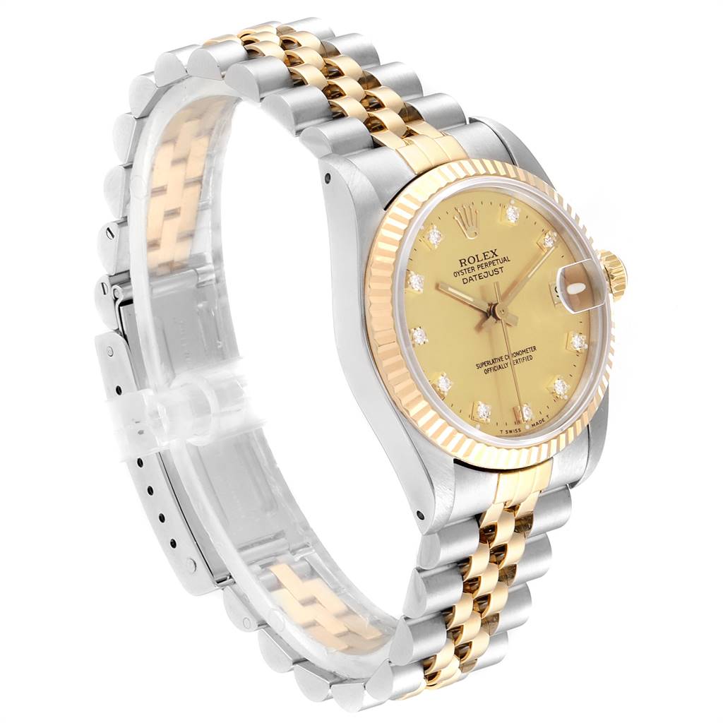 The image displays a side angle of a Rolex Mid-Size 68273 Women's Steel and Gold (two tone) Champagne Dial 68273 Women's Steel and Gold (two tone) Champagne Dial Datejust watch, showing its bracelet, case, and dial.