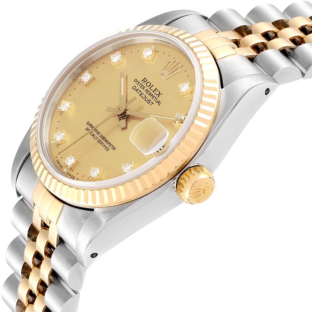 The image shows a Rolex Mid-Size 68273 Women's Steel and Gold (two tone) Champagne Dial 68273 Women's Steel and Gold (two tone) Champagne Dial Datejust watch at an angle highlighting the case, dial, bezel, bracelet, and crown.
