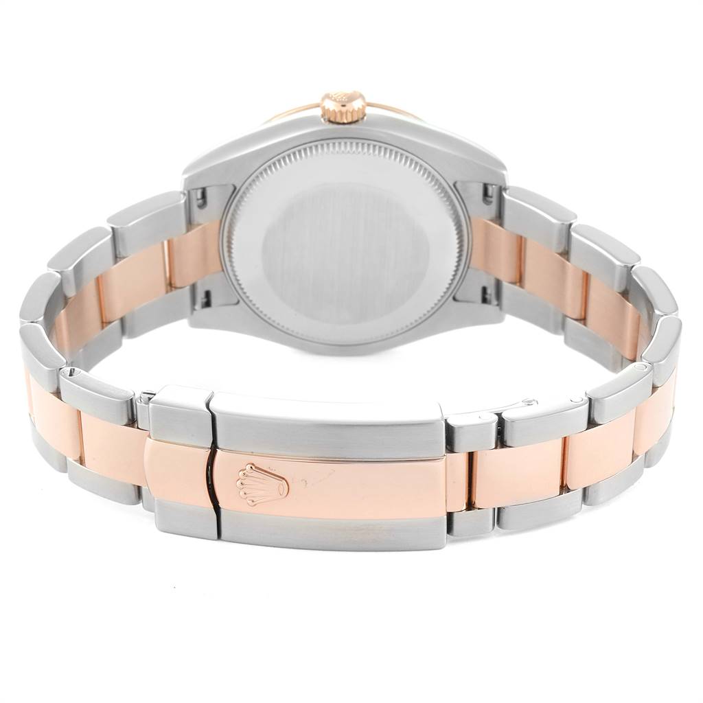 This image shows the back and bracelet of a Mid-Size Rolex watch, viewed from a rear angle.