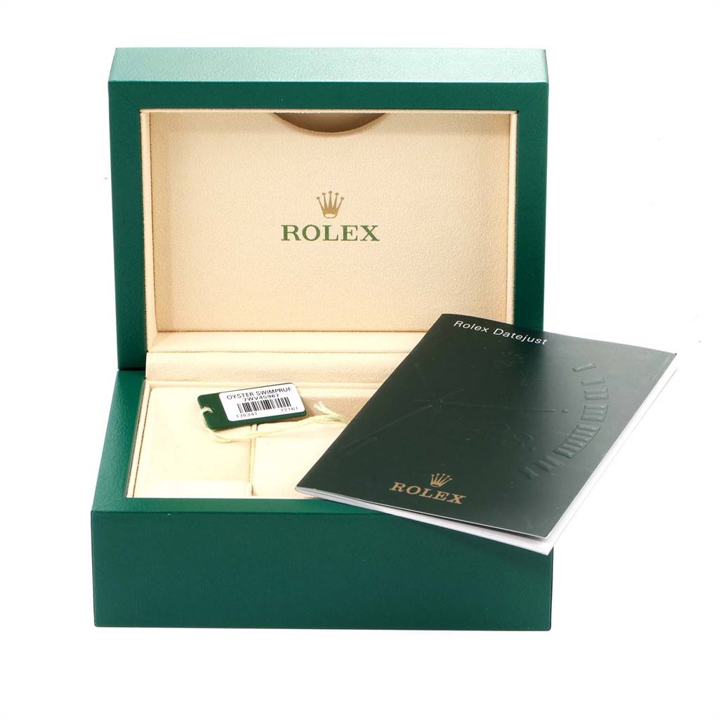 The image shows a green Rolex box for a Mid-Size model and includes a booklet and a tag.