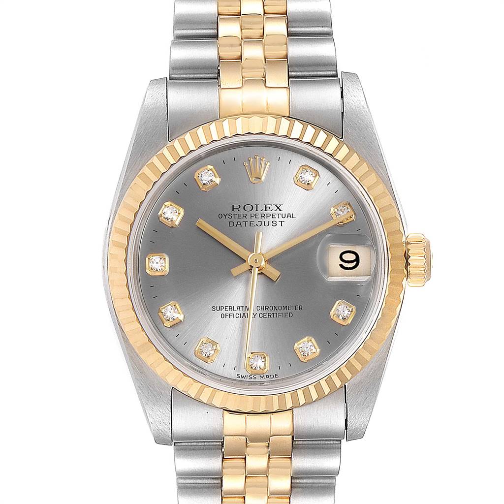The image shows a front angle view of a mid-size Rolex Oyster Perpetual Datejust watch with a two-tone bracelet and a fluted bezel.