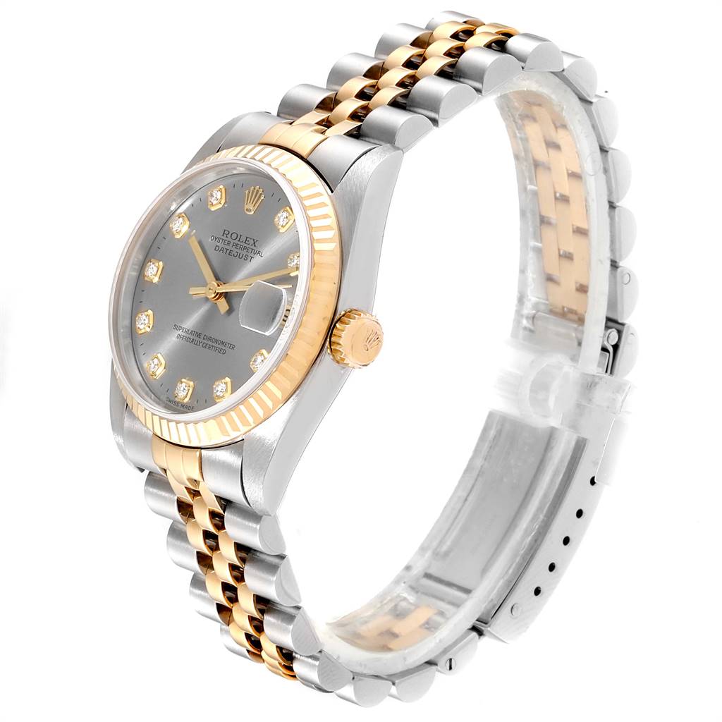 The image shows a Rolex Mid-Size 68273 Women's Steel and Gold (two tone) Silver Dial 68273 Women's Steel and Gold (two tone) Silver Dial Oyster Perpetual Datejust watch at an angled side view, highlighting its two-tone bracelet and fluted bezel.