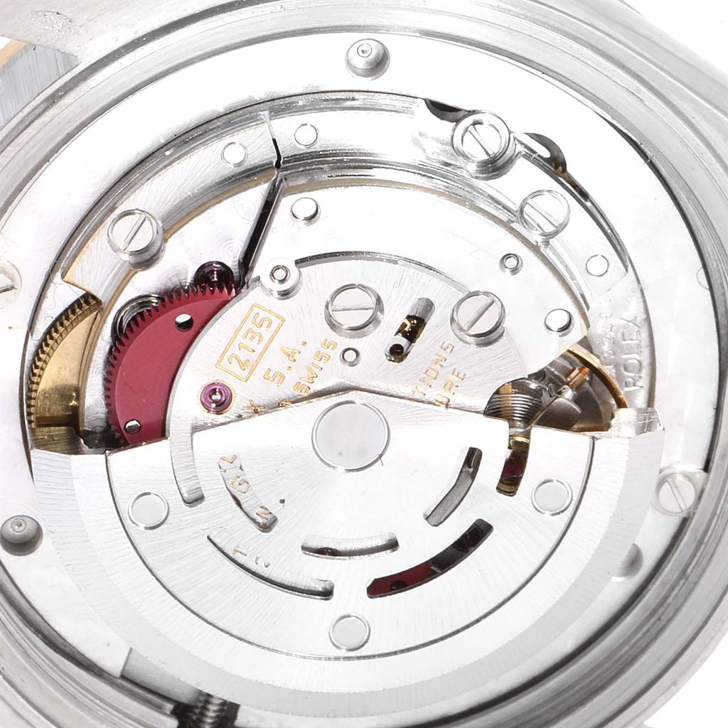 The image shows the internal mechanical movement of a Rolex Mid-Size 68273 Women's Steel and Gold (two tone) Beige Dial 68273 Women's Steel and Gold (two tone) Beige Dial watch from a close-up angle.