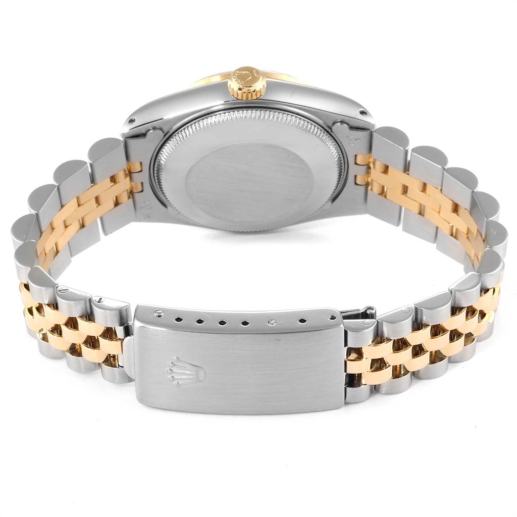 This image shows the back of a Rolex Mid-Size 68273 Women's Steel and Gold (two tone) Beige Dial 68273 Women's Steel and Gold (two tone) Beige Dial watch, highlighting its two-tone bracelet and clasp.