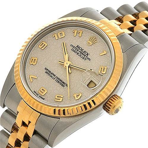 The image shows a tilted view of the Mid-Size Rolex Datejust watch, displaying its face, bezel, crown, and part of the two-tone bracelet.